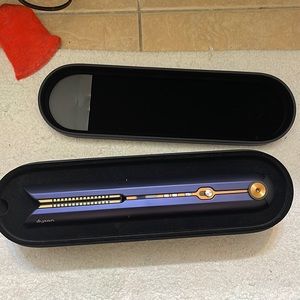 The Dyson hair straightener it starts out between 350 and 450°